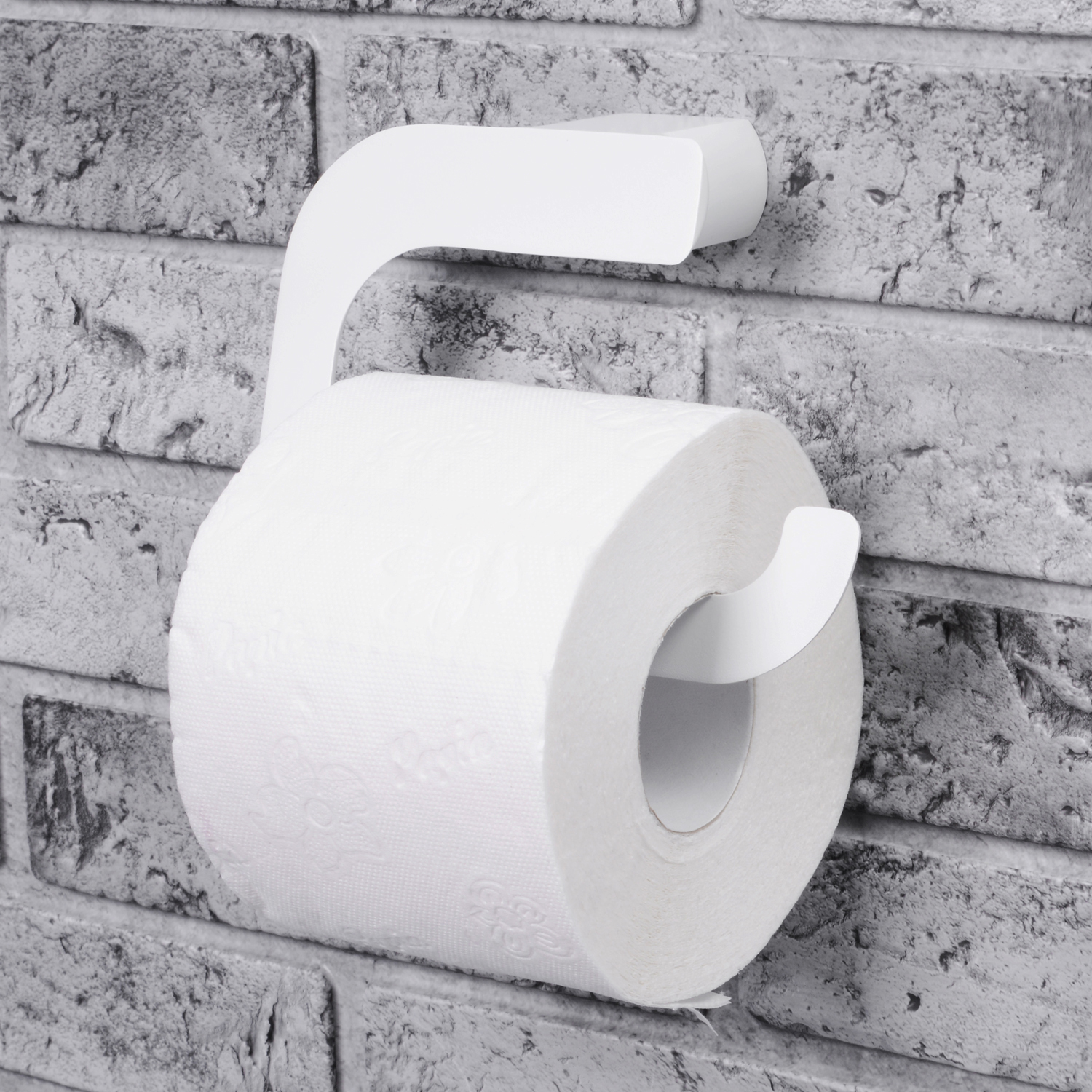 Держатель туалетной бумаги Wasserkraft Kammel K-8300White — на стене из серого кирпича
